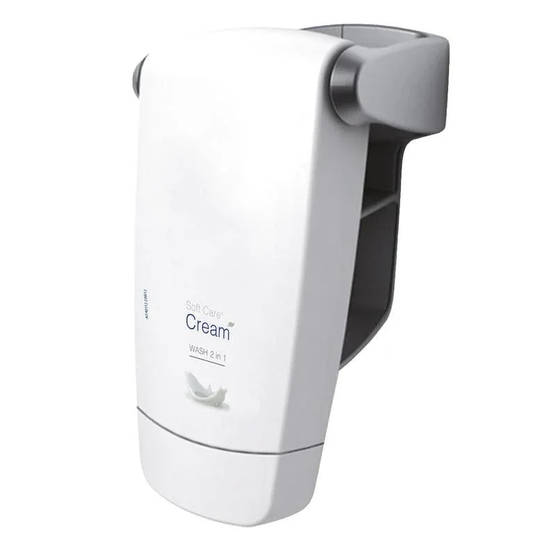 Ein weißer Wandspender mit der Aufschrift "Soft Care Cream Wash 2 in 1, Duschgel und Haarshampoo | Flasche (250 ml)" von Diversey Deutschland GmbH & Co. OHG zeichnet sich durch eine Taubengrafik, ein geschwungenes Design und einen grauen Druckhebel zur einfachen Entnahme von Gel oder Shampoo aus.