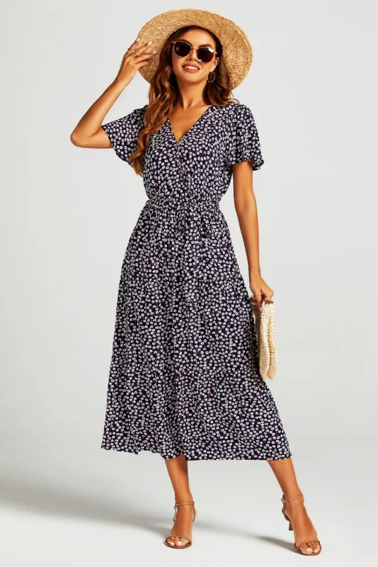 Printed tiered midi dress with wrap front and leg slit in navy