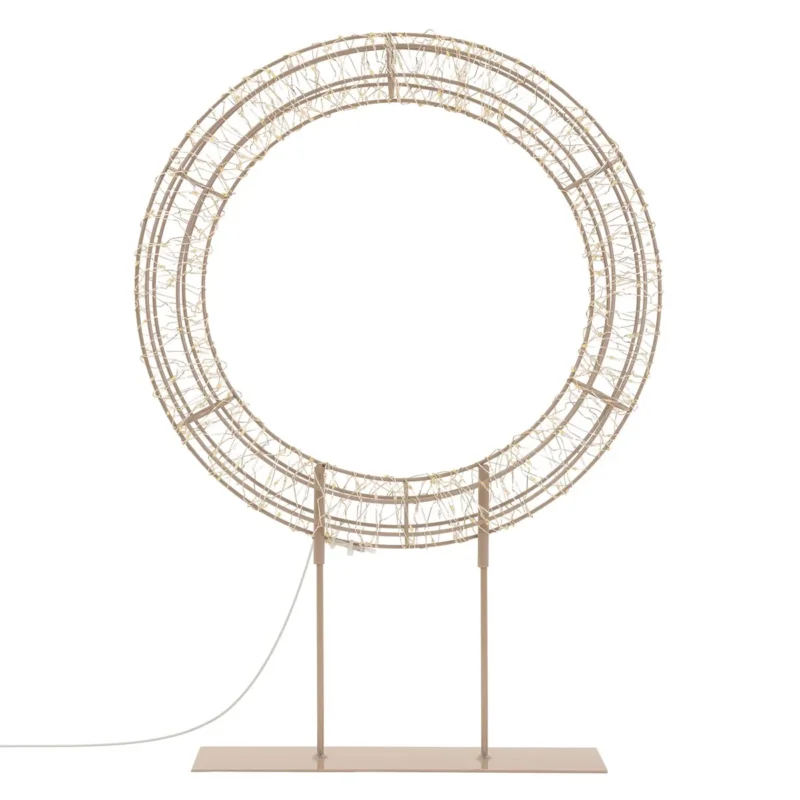 Stehlampe in runder Form mit einem Drahtgestell auf einem stabilen Sockel.