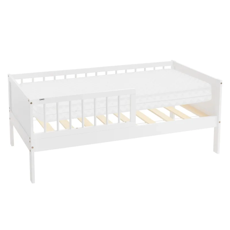 Weißes Bett mit Matratze und Lattenrost, ohne Bettwäsche.