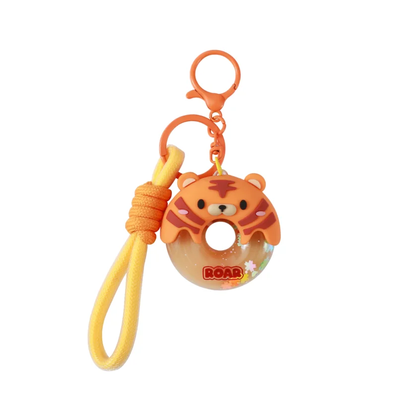 itotal Schlüsselanhänger Donut Tiger, orangefarbene Figur, gelbe Kordel, Karabiner, Kunststoff.